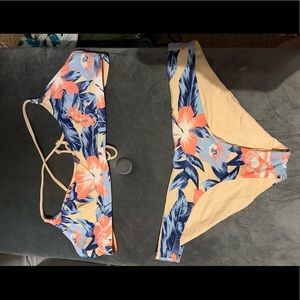 Rip curl peach swimsuit floral tropical print